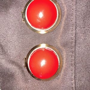 Red round clip on earrings